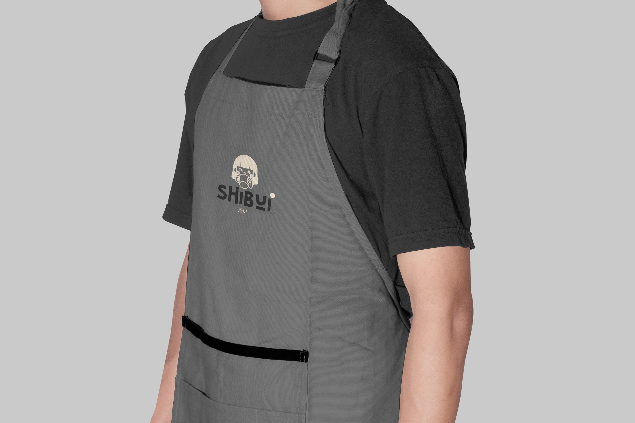 Delantal gris con el logo de Shibui